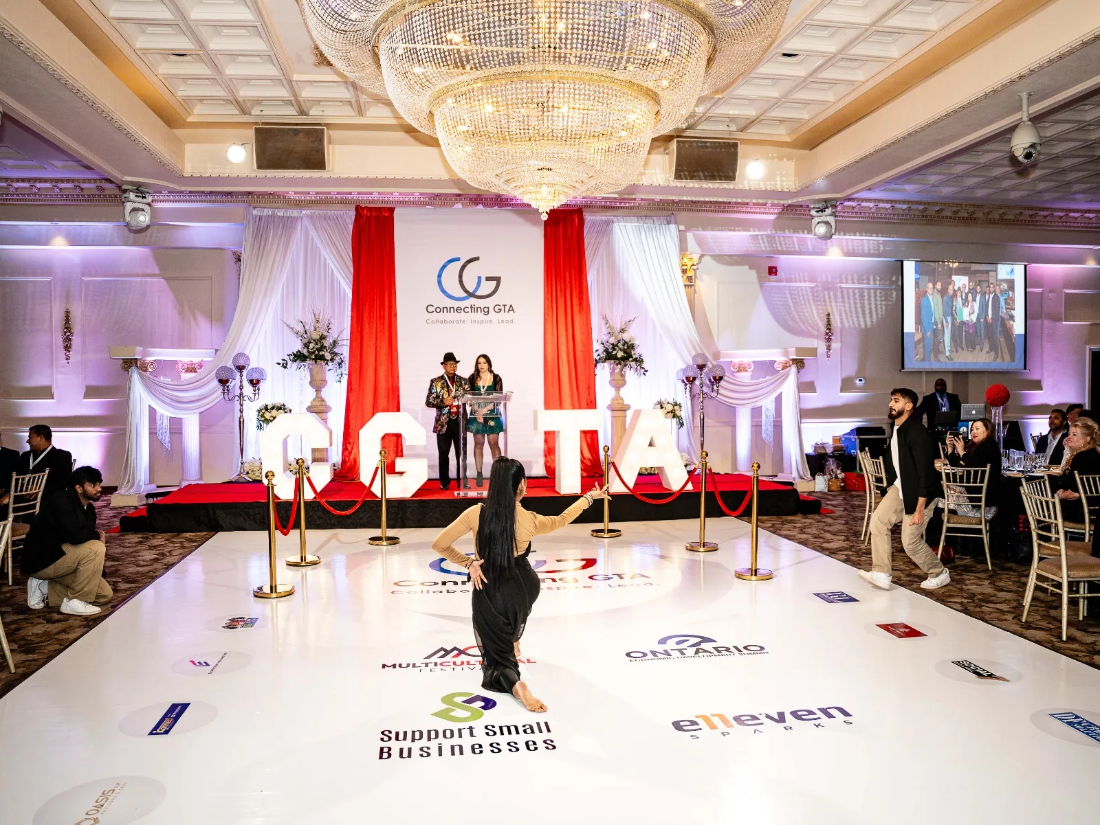 Banquet tables and gold award trophies set for the Ignite A Life Awards gala